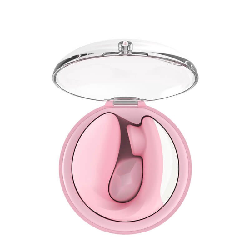 Imagem estojo aberto com vibrador sugador clitoriano rosa