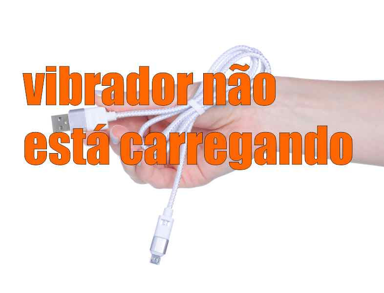 mão feminina segurando cabo carregador post por que meu vibrador não carrega