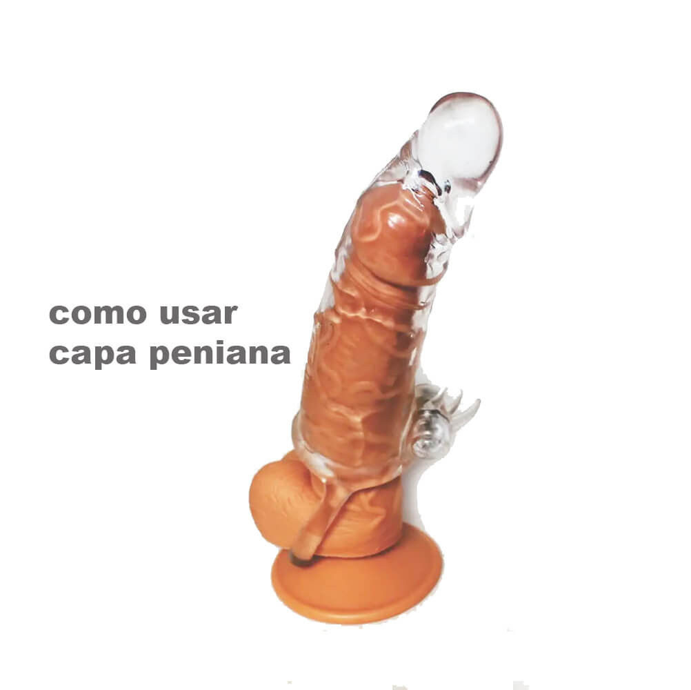 capa peniana extensora transparente vestida em um penis de borracha cor pele clara