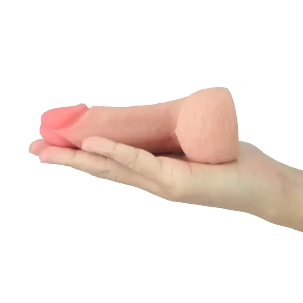 pênis sobre mão feminina em cyberskin sem ereção 