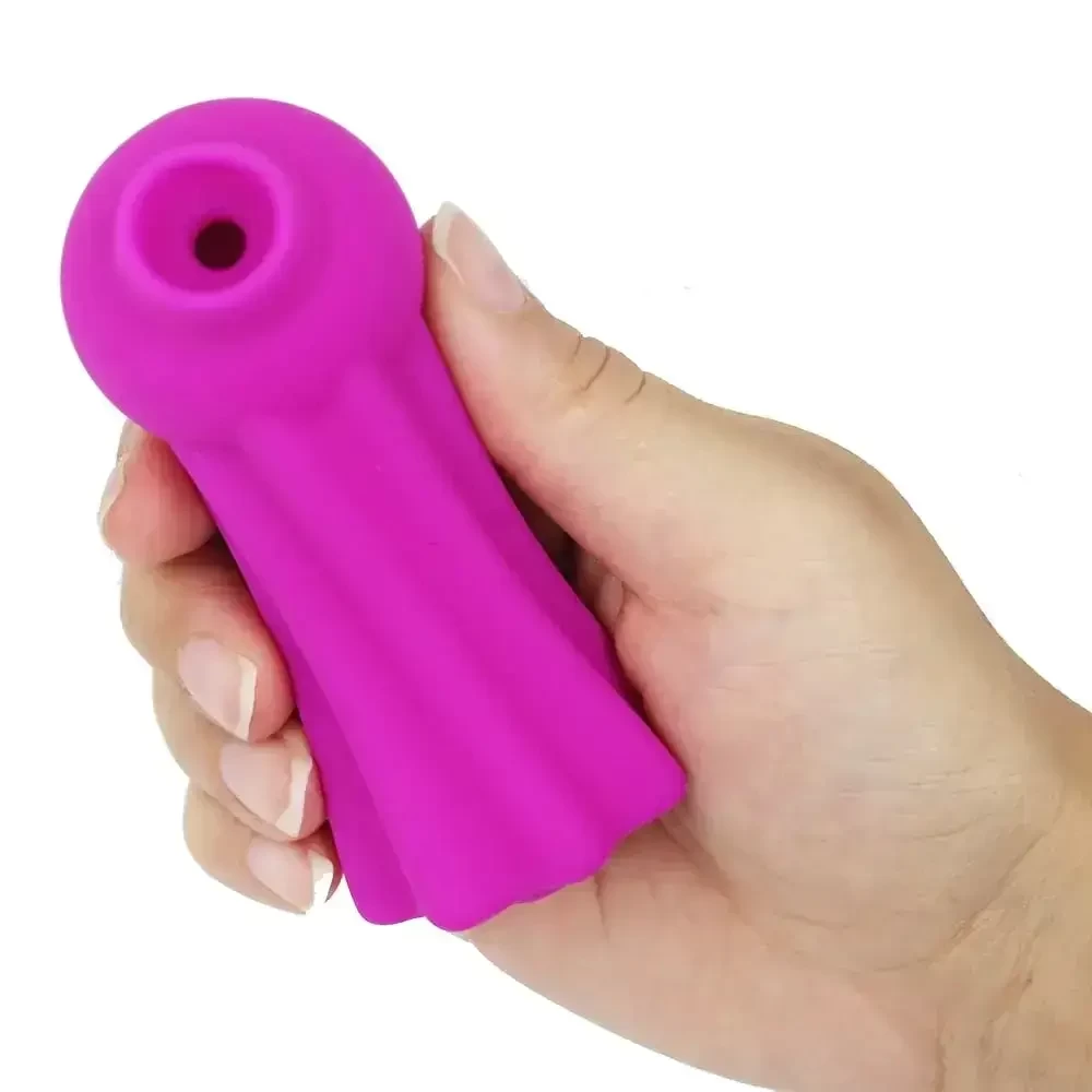 imagem de uma mão segurando vibrador sugador clitoriano sun sex
